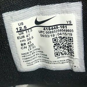 nike air monarch black and white